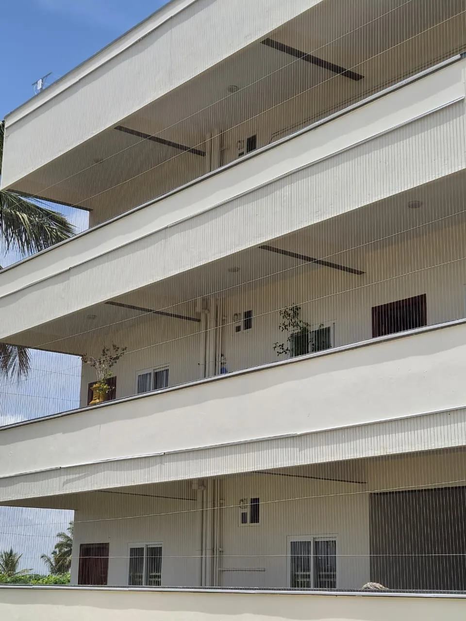Invisible Grills installed on a Bangalore home balcony